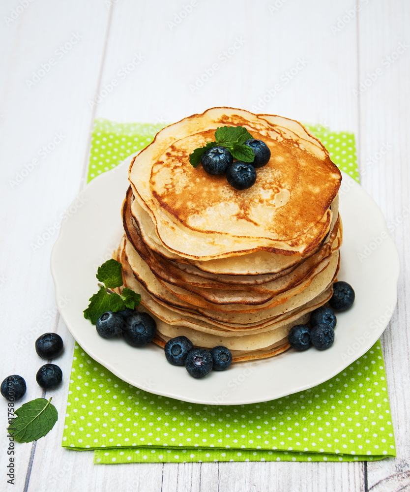 Plate with pancakes and blueberries Plate with pancakes and blueberries