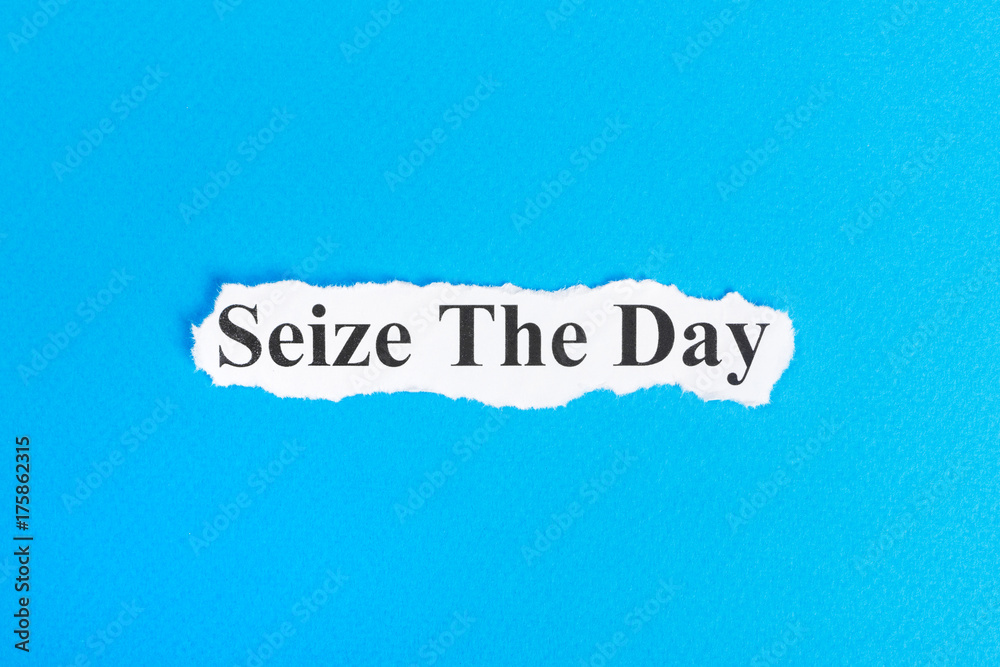 Seize The Day text on paper. Word Seize The Day on torn paper. Concept Image Seize The Day text on paper. Word Seize The Day on torn paper. Concept Image