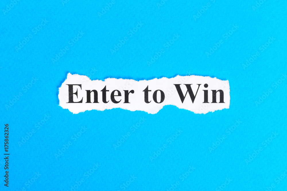 Enter to win text on paper. Word Enter to win on torn paper. Concept