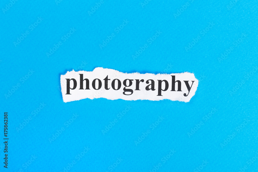 PHOTOGRAPHY text on paper. Word PHOTOGRAPHY on torn paper. Concept Image PHOTOGRAPHY text on paper. Word PHOTOGRAPHY on torn paper. Concept Image