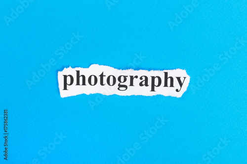 PHOTOGRAPHY text on paper. Word PHOTOGRAPHY on torn paper. Concept Image