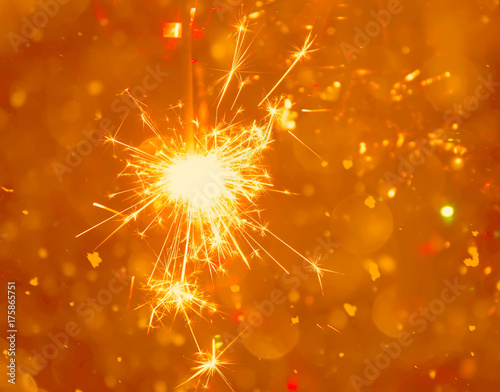 Bengali fire. Festive firework salute burst. Festive new year background.