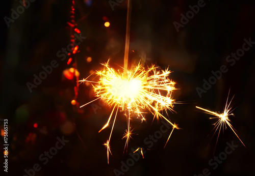 Bengali fire. Festive firework salute burst. Festive new year background.