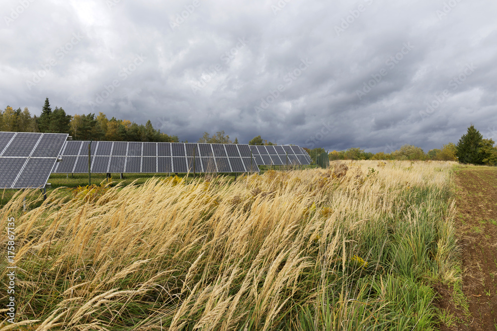 Solar Power Station on the autumn Meadow 