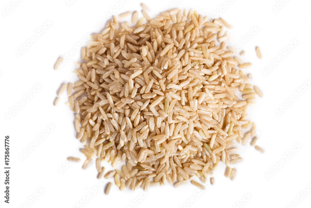 Pile of brown rice isolated on white background. Pile of brown rice isolated on white background.