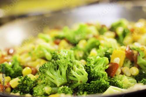 Sauteed Broccoli served with Sweet Corn and an assortment of Roasted Bell Peppers