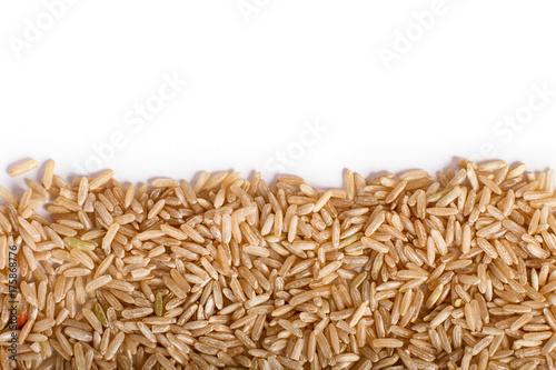 Texture of  brown rice isolated on white background.