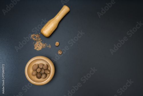 Nutmeg. on a black background. Top view