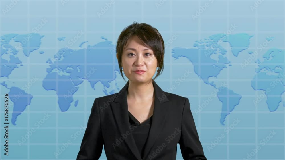 News presenter in studio with map display in background News presenter in studio with map display in background