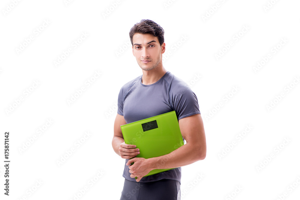 Man with scales in sports and health concept isolated on white Man with scales in sports and health concept isolated on white