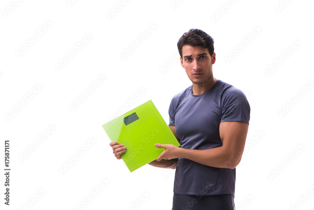 Man with scales in sports and health concept isolated on white Man with scales in sports and health concept isolated on white