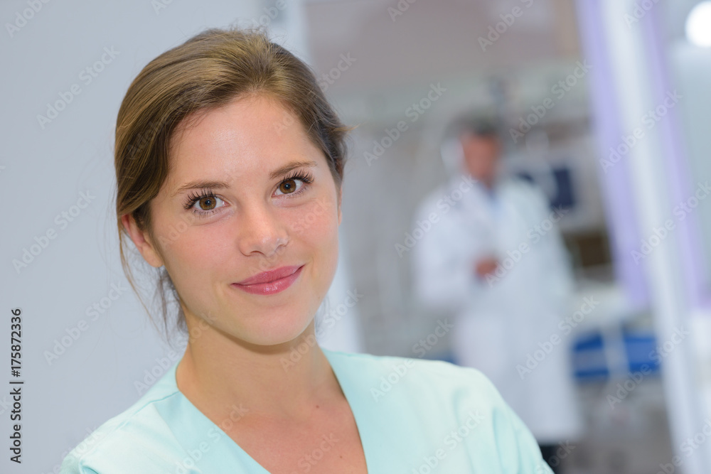 portrait of beautiful nurse looking at camera