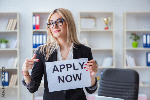 Free Download Young businesswoman with message in the office - GFXLoad