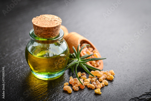 A bottle of frankincense essential oil photo