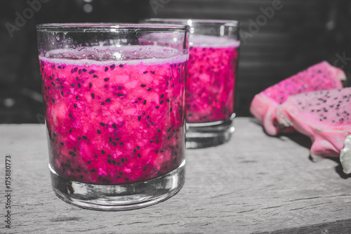 Red Dragon Fruit Juice in Cocktail Glass with Bokeh or Blur Effect 