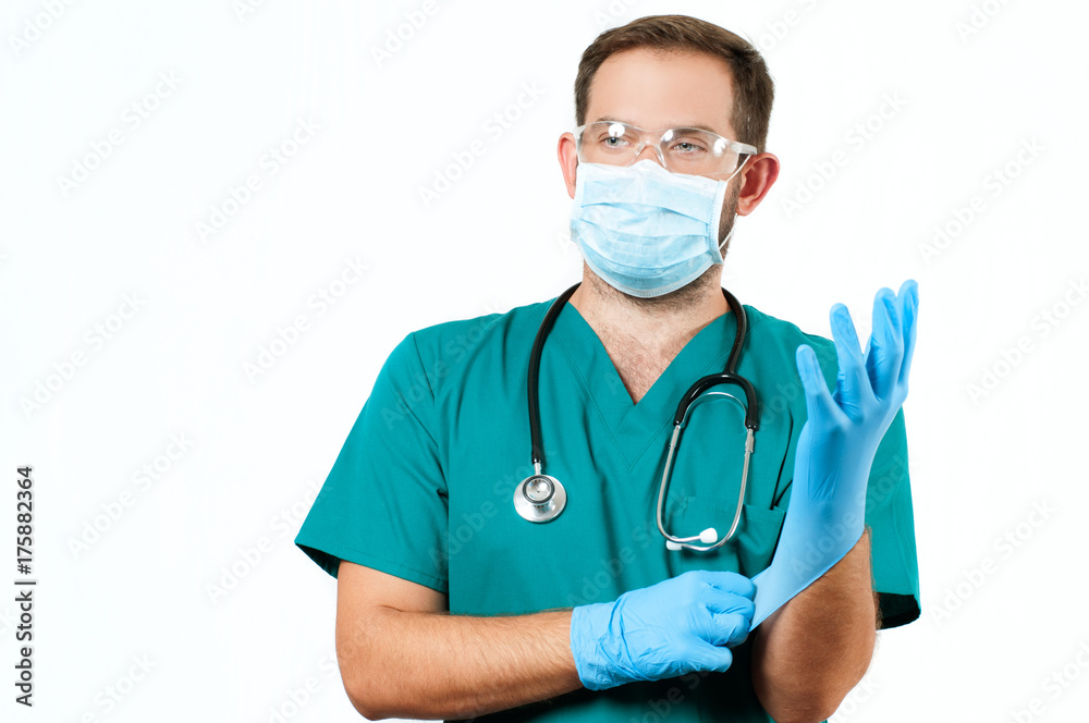 Male Doctor with stethoscope and protective mask and gloves. Male Doctor with stethoscope and protective mask and gloves.