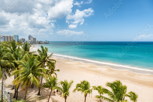 Beach travel Caribbean vacation landscape of Puerto Rico background. Isla Verde in San Juan, Latin America island. photo