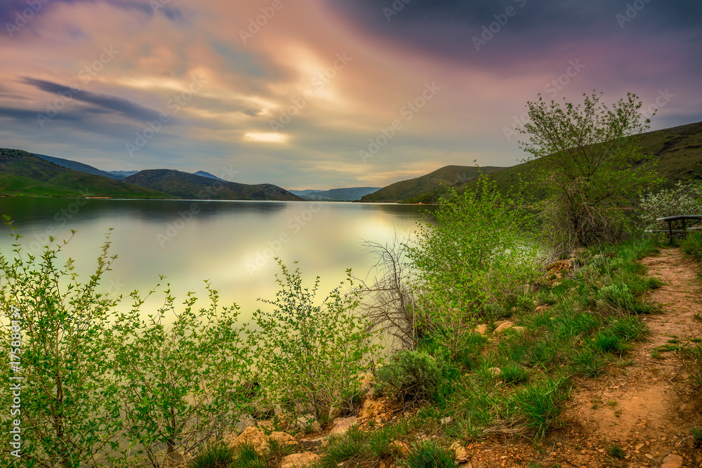 Long exposure of mountain lake at sunset