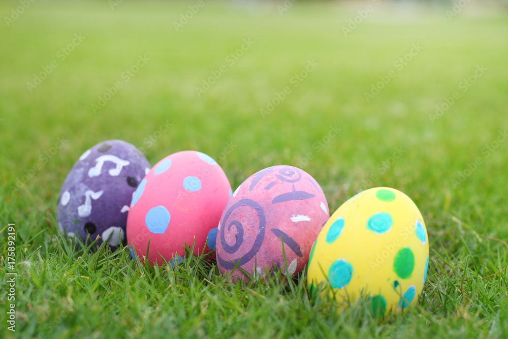 Eggs painted pastel line in the grass backgroud. Eggs painted pastel line in the grass backgroud.