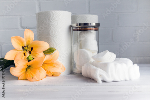 Paper towel  cotton pads and cotton wool - hygienic disposable products - concept of body care and cosmetic products.