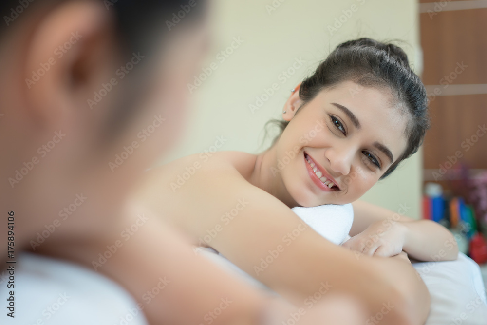 Two cute young women during a skin care treatment at a spa. Two cute young women during a skin care treatment at a spa.