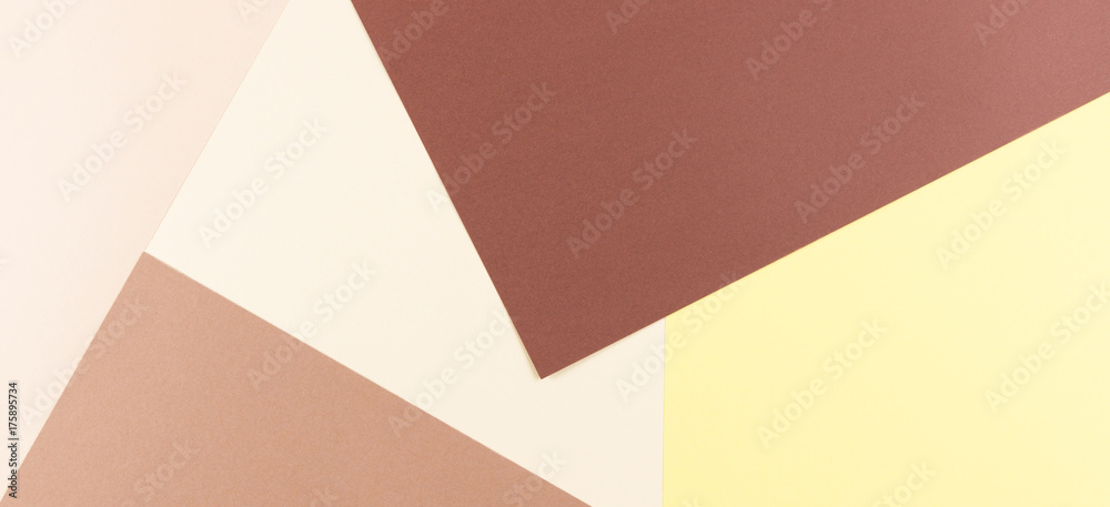 Colorful paper background of yellow, beige, soft and dark brown paper. Colorful paper background of yellow, beige, soft and dark brown paper.