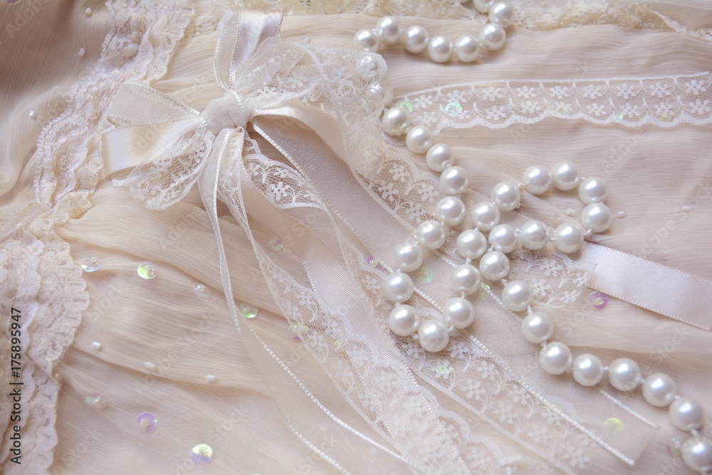 wedding decoration, string of pearls on lace fabric with embroidery, a great addition to the wedding dress