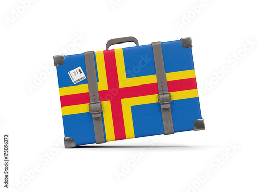 Luggage with flag of aland islands. Suitcase isolated on white