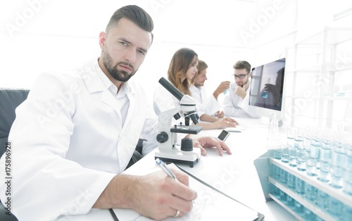 young scientist works in the lab.