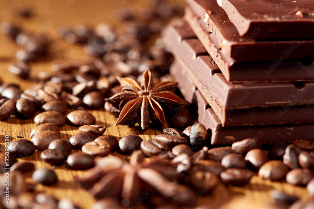 Aroma coffee chocolate cookies and spices on the wooden table. Dark wooden background. Top view. Close. Closeup. Aroma coffee chocolate cookies and spices on the wooden table. Dark wooden background. Top view. Close. Closeup.
