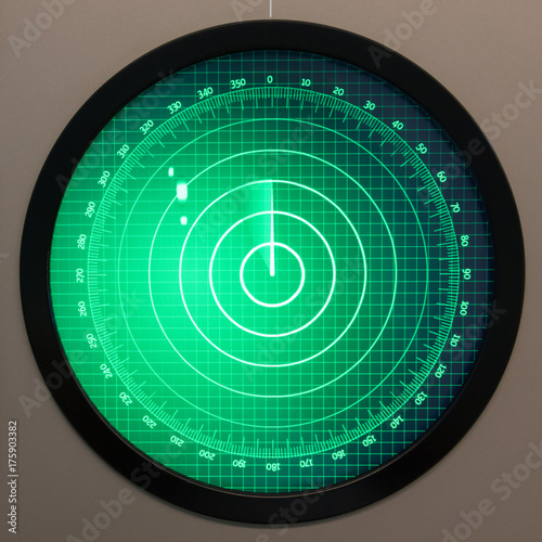 Green radar screen with dots