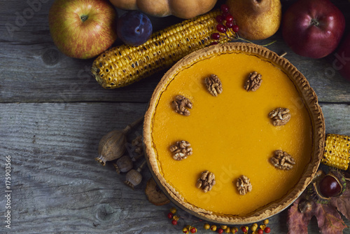 Autumn background. Homemade Pumpkin Pie for Thanksgiving Ready to Eat. Design mock up