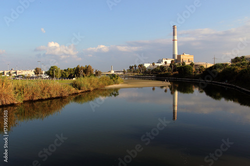 View of the Yarkon river, Reading Power Station, from Bridge in Tel-Aviv, Israel. © boris_sh