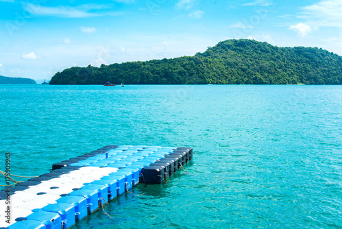 Floating walk way pontoon in the sea.