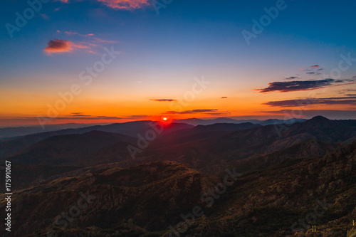 Sunset over mountain hills, aerial panoramic view © ValentinValkov