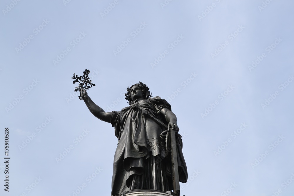 Fototapeta premium Majestic monument in Place de la Republique, republic symbol of liberty, equality and fraternity, in Paris, France