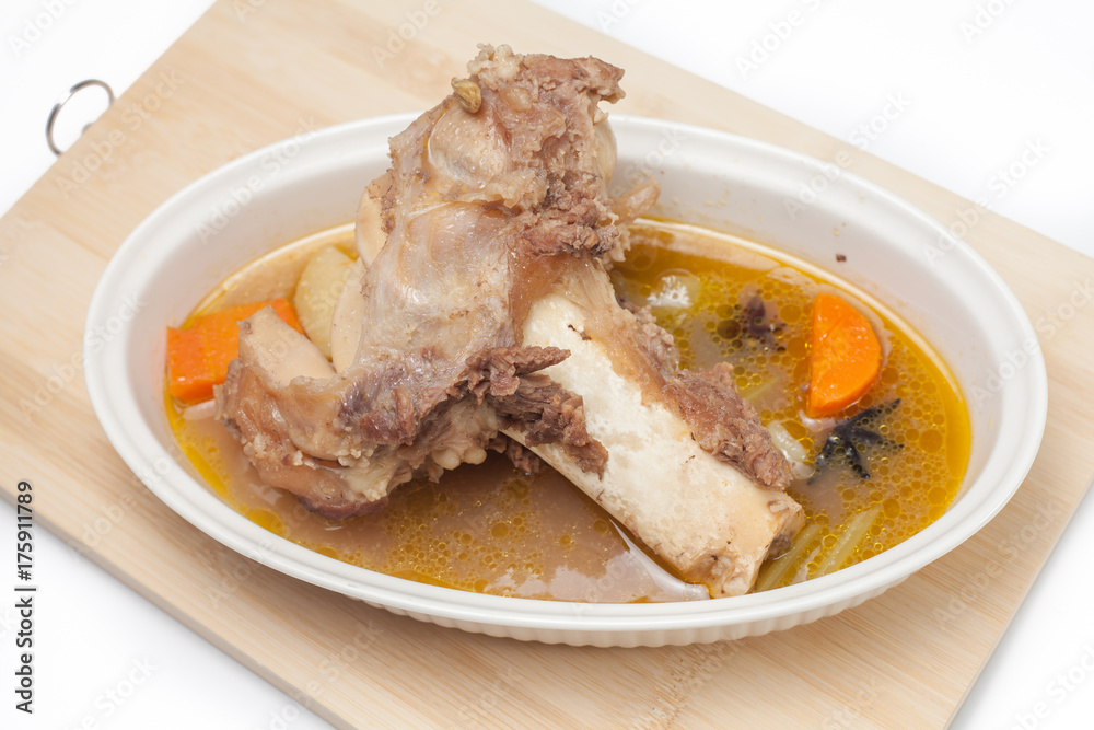cannon ball cow soup, also known as soup gear box on wooden cutting board cannon ball cow soup, also known as soup gear box on wooden cutting board