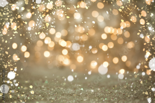 Cute simple Bokeh blurred lights Backgrounds with Snow: Golden Sparkles