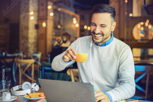 Young businessman in coffee shop