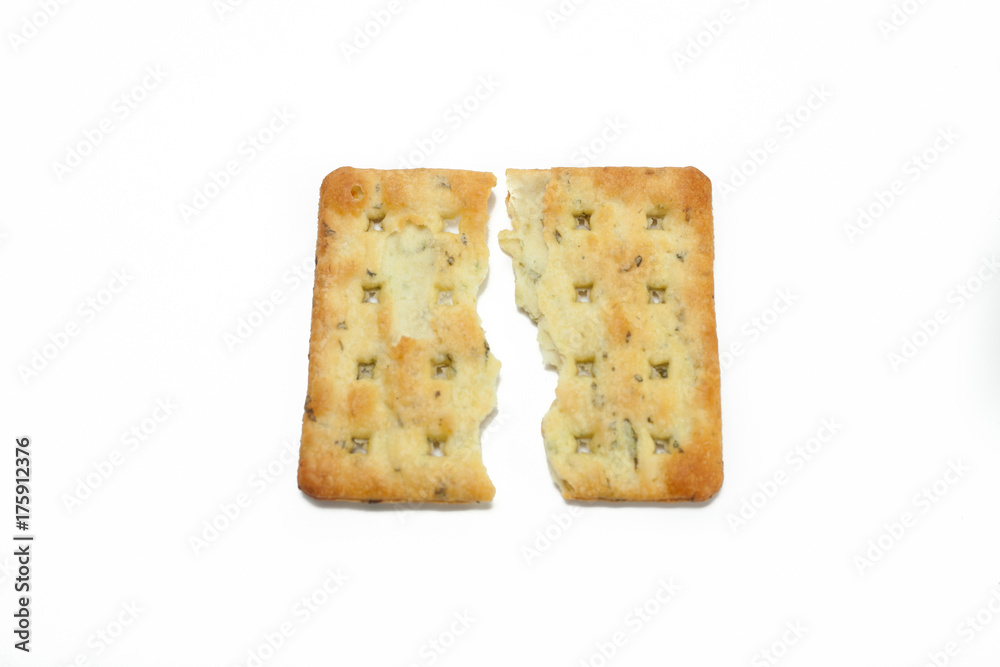 break into two vegetable cream cracker biscuits isolated white background break into two vegetable cream cracker biscuits isolated white background