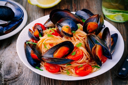 Seafood pasta spaghetti with mussels and tomatoes