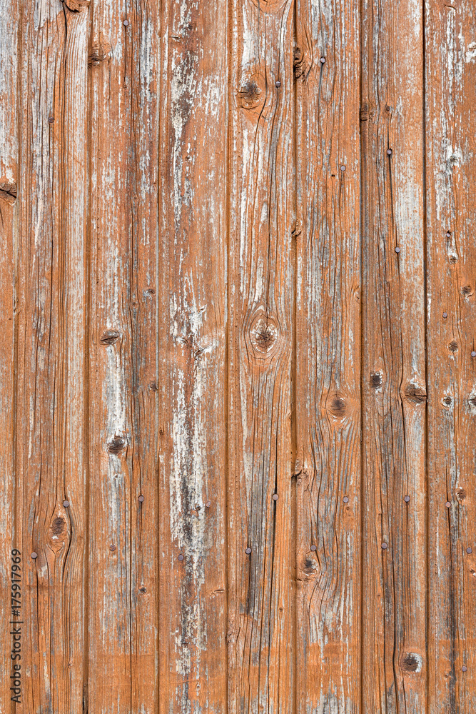 SAINT-LEONARD-DE-NOBLAT, FRANCE - 22 JULY, 2017: Detail of old, weathered and distressed wooden planks. SAINT-LEONARD-DE-NOBLAT, FRANCE - 22 JULY, 2017: Detail of old, weathered and distressed wooden planks.