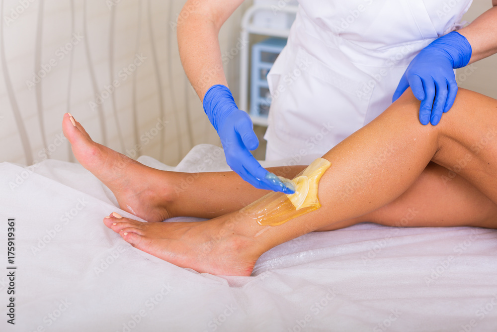 Fototapeta premium Woman cosmetologist in a spa salon