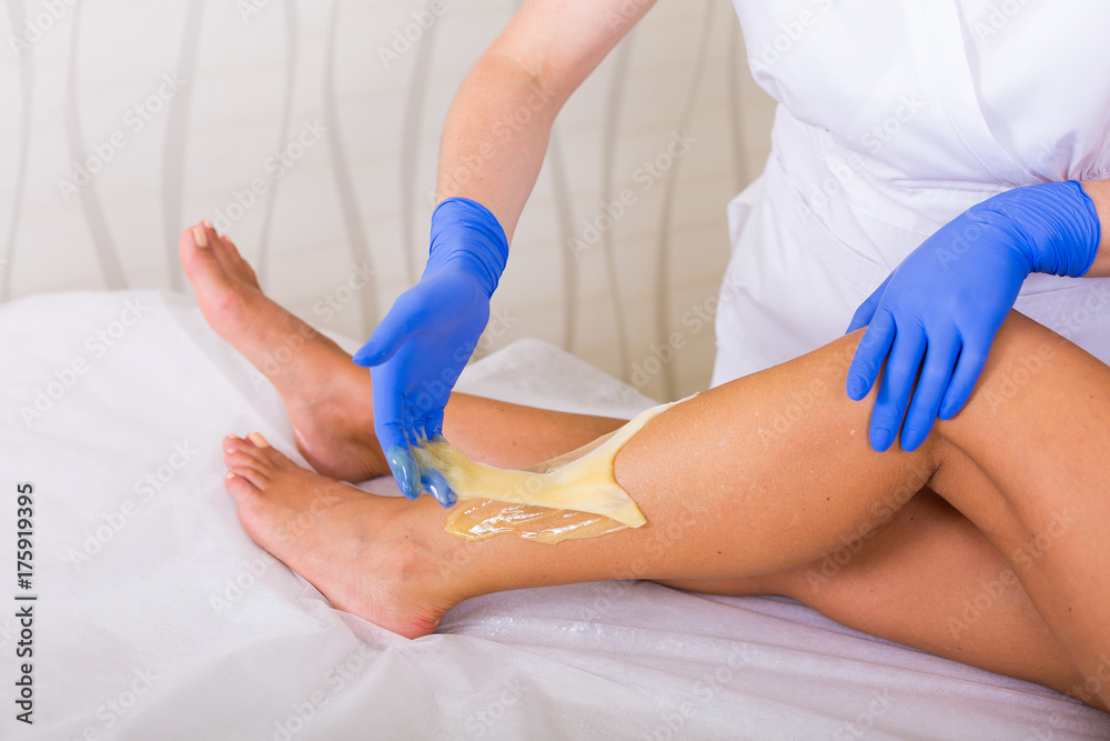 Fototapeta premium Woman cosmetologist in a spa salon