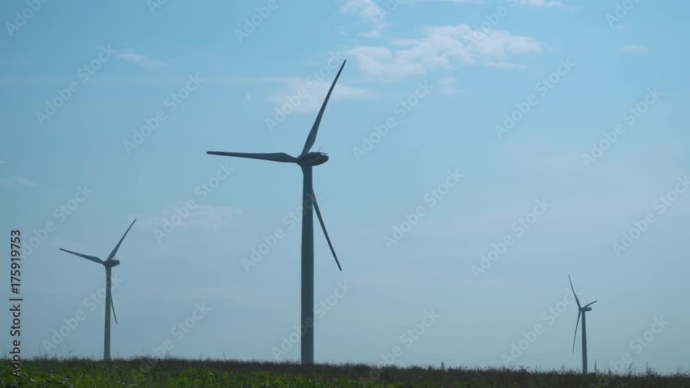 Wind farm in the field, rotating blades, alternative renewable energy sources. Wind turbine.
Wind farm in the field, rotating blades, alternative renewable energy sources. Wind turbine.