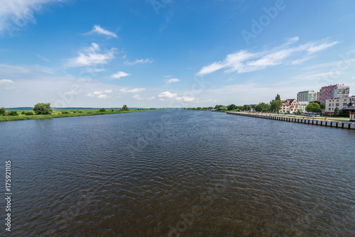 Regalica River, arm of Oder River - view from bridge in Gryfino, Poland photo