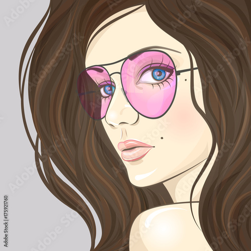Fashion girl in aviator sun glasses. Beautiful female face close up