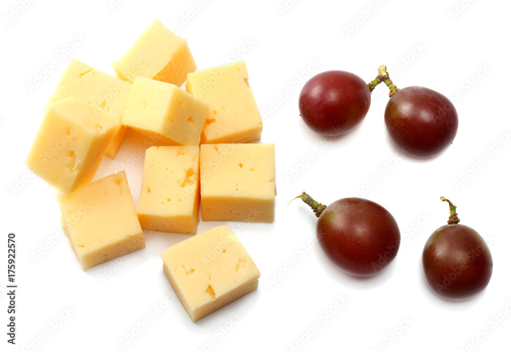 piece of cheese with grapes isolated on white background piece of cheese with grapes isolated on white background
