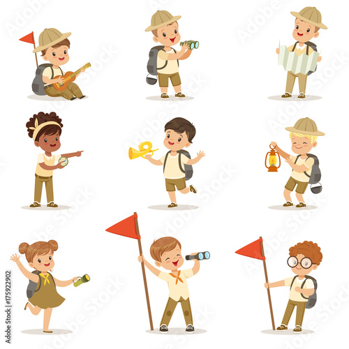 Set of girls and boys in scout costumes