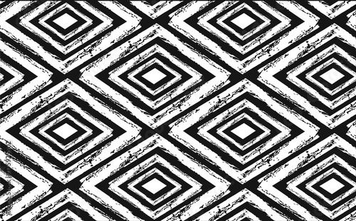 Hand drawn seamless tribal pattern in black and cream. Modern textile, wall art, wrapping paper, wallpaper design.
